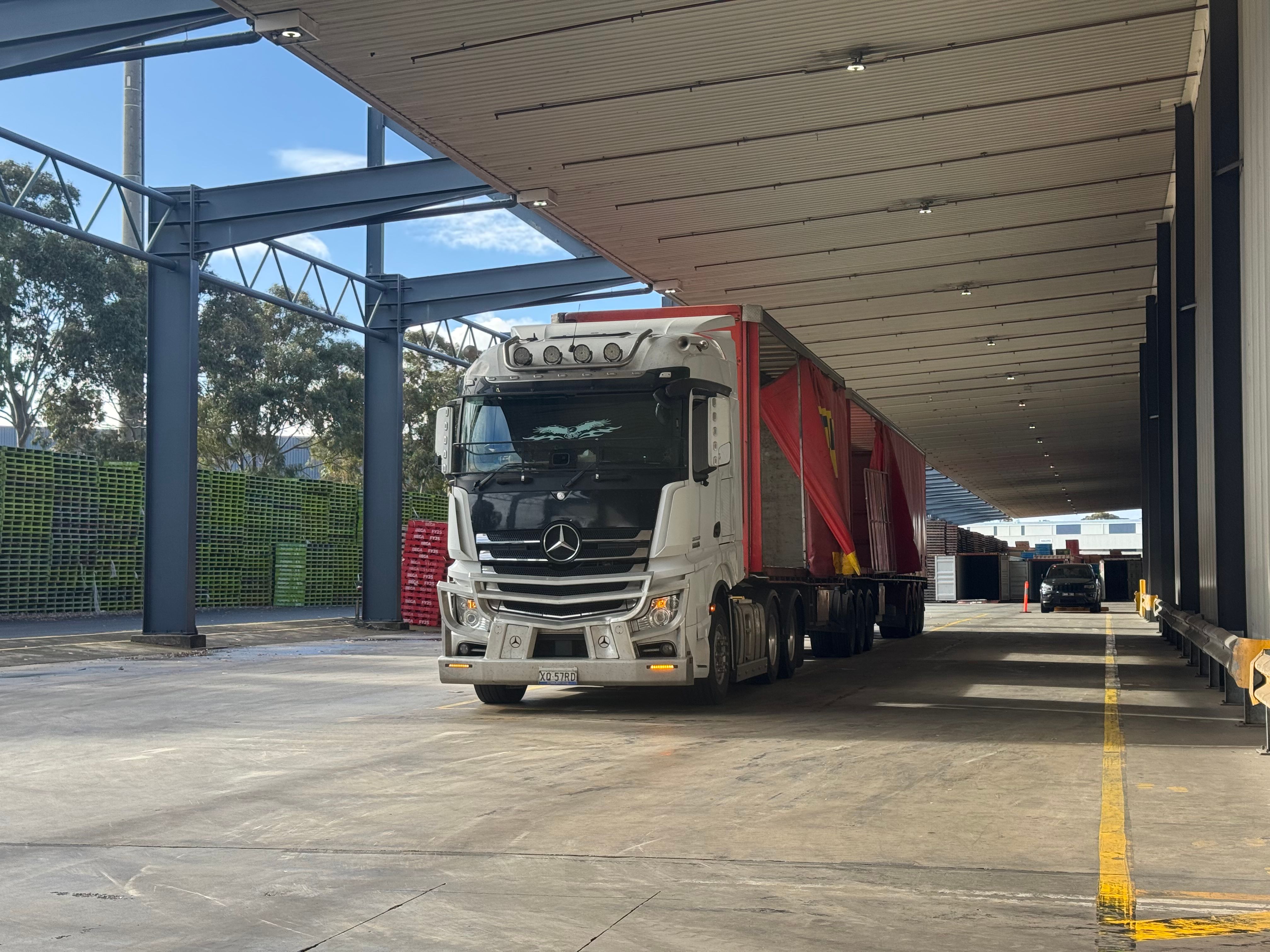 Cox Logistics fleet of trucks ready for delivery